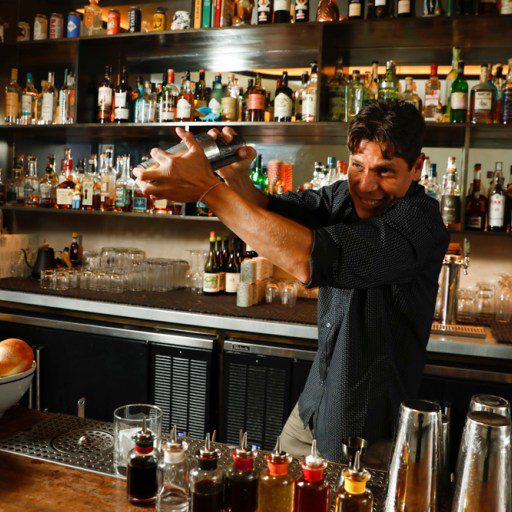 sherwood bartender shaking cocktail